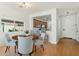 Bright dining area with wood floors and kitchen views at 1381 W Birch Rd, Queen Creek, AZ 85140