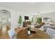 Spacious living room with hardwood floors and large windows at 1381 W Birch Rd, Queen Creek, AZ 85140