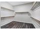 Walk-in closet features built-in shelves and plenty of room for organized storage at 1612 E Zion Way, Chandler, AZ 85249