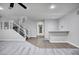Spacious living space features stairs, bar, plush carpet, and neutral color palette at 1612 E Zion Way, Chandler, AZ 85249