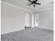 Large Living Room with neutral carpet and paint, plus arched doorway to other parts of the house at 1612 E Zion Way, Chandler, AZ 85249