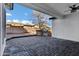 A covered patio with pavers offers a built-in grill area and plenty of space for entertaining at 1612 E Zion Way, Chandler, AZ 85249