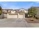 Two-story house with a three-car garage and basketball hoop at 17948 W Diana Ave, Waddell, AZ 85355