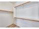 Large closet with double hanging rods and shelves at 19009 N 25Th Pl, Phoenix, AZ 85050