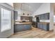 Modern kitchen featuring gray cabinets and wood countertops at 19009 N 25Th Pl, Phoenix, AZ 85050