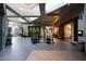 Bright lobby with seating areas and a green wall at 20309 N Windy Walk Ct, Surprise, AZ 85374