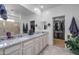 Large bathroom with double vanity and walk-in closet at 21269 W Haven Dr, Buckeye, AZ 85396