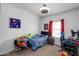 bedroom with a bed and workspace at 21269 W Haven Dr, Buckeye, AZ 85396