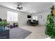 Bright dining area with dark wood table and six chairs at 21269 W Haven Dr, Buckeye, AZ 85396