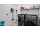 Laundry room with washer, dryer, and storage at 21269 W Haven Dr, Buckeye, AZ 85396
