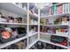 Well-organized pantry with ample shelving for storage at 21269 W Haven Dr, Buckeye, AZ 85396