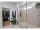Large walk-in shower with a built-in seat at 21269 W Haven Dr, Buckeye, AZ 85396