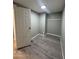 Bright bedroom with wood-look floors and ample closet space at 245 S 56 St # 174, Mesa, AZ 85206