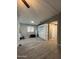 Open living area with built-in shelving and wood-look floors at 245 S 56 St # 174, Mesa, AZ 85206