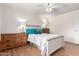 Well-lit bedroom with light wooden furniture at 2643 E Boise St, Mesa, AZ 85213