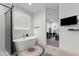 Modern bathroom with a large soaking tub and walk-in shower at 2826 N 28Th Pl, Phoenix, AZ 85008