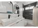 Bathroom with modern double sinks and a shower/tub combo at 2826 N 28Th Pl, Phoenix, AZ 85008