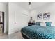 Spacious bedroom with teal bedding and large closet at 2826 N 28Th Pl, Phoenix, AZ 85008