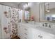 Bathroom with double vanity and decorative mirror at 30432 N 43Rd Pl, Cave Creek, AZ 85331