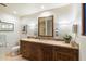 Bathroom with double vanity and large mirror at 34587 N Ironwood Rd, Scottsdale, AZ 85266