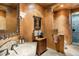 Elegant bathroom with decorative tile and a spacious vanity at 34587 N Ironwood Rd, Scottsdale, AZ 85266