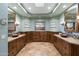 Luxurious bathroom with dual vanities, copper sinks, and a large shower at 34587 N Ironwood Rd, Scottsdale, AZ 85266