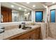 Bathroom with copper sink and tile flooring at 34587 N Ironwood Rd, Scottsdale, AZ 85266