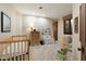 bedroom with twin bed and crib at 34587 N Ironwood Rd, Scottsdale, AZ 85266