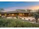 Backyard patio with built-in grill and desert landscaping at 34587 N Ironwood Rd, Scottsdale, AZ 85266