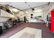 Finished garage, exercise equipment, and extra storage at 34587 N Ironwood Rd, Scottsdale, AZ 85266