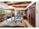 Island kitchen with granite countertops and stainless steel appliances at 34587 N Ironwood Rd, Scottsdale, AZ 85266