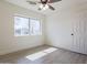 Bright bedroom with large window offering natural light at 353 Ancora S Dr, Litchfield Park, AZ 85340