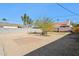 Spacious backyard with a patio and mature trees at 4129 N 17Th St, Phoenix, AZ 85016