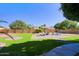 Artificial turf lawn with a patio and seating area at 4222 E Mclellan Cir # 7, Mesa, AZ 85205