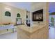 Luxury bathroom with a fireplace, soaking tub, and marble vanity at 4222 E Mclellan Cir # 7, Mesa, AZ 85205