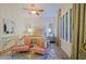 Bright bedroom featuring a comfortable bed and seating area at 4222 E Mclellan Cir # 7, Mesa, AZ 85205