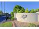 Community entrance with a gated entry and signage at 4222 E Mclellan Cir # 7, Mesa, AZ 85205