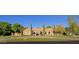 Grand estate home showcasing a classic design and manicured lawn at 4222 E Mclellan Cir # 7, Mesa, AZ 85205