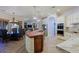Gourmet kitchen boasts expansive island, stainless steel appliances, and marble countertops at 4222 E Mclellan Cir # 7, Mesa, AZ 85205
