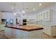 Gourmet kitchen with double ovens, large island, and custom cabinetry at 4222 E Mclellan Cir # 7, Mesa, AZ 85205