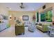Living room with comfortable seating and large windows at 4222 E Mclellan Cir # 7, Mesa, AZ 85205