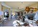 Living room with fireplace, large windows, and elegant decor at 4222 E Mclellan Cir # 7, Mesa, AZ 85205