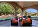 Covered patio with comfortable seating and string lights at 4222 E Mclellan Cir # 7, Mesa, AZ 85205