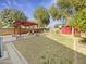 Spacious backyard with a pergola and lush grass at 4350 E Longhorn St, San Tan Valley, AZ 85140