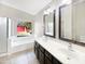 Bathroom with double vanity, soaking tub, and large mirror at 4350 E Longhorn St, San Tan Valley, AZ 85140