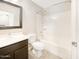 Clean bathroom with tub, shower, and dark brown vanity at 4350 E Longhorn St, San Tan Valley, AZ 85140
