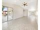 Open living area with tile floors and access to backyard at 4350 E Longhorn St, San Tan Valley, AZ 85140