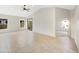Bright and spacious living room with tile flooring and access to backyard at 4350 E Longhorn St, San Tan Valley, AZ 85140