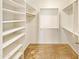 Large walk-in closet with ample shelving and hanging space at 4350 E Longhorn St, San Tan Valley, AZ 85140