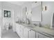 Double vanity bathroom with modern light fixtures at 4515 N 36Th Way, Phoenix, AZ 85018